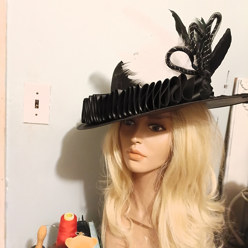 Elegant Black and White Feathered Hat